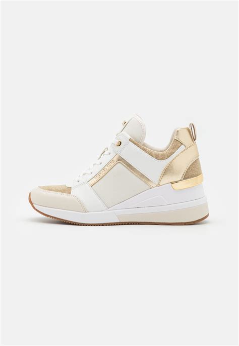 michael kors pale gold sneakers|Meer.